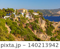 Paleokastritsa Monastery on rocky cliff in Corfu, Greece 140213942