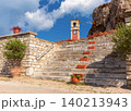 Stone staircase with clock tower in Corfu, Greece 140213943