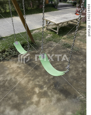Garden with flowerbed and colorful tropical plants 140214464