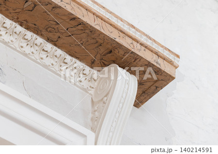 Close-up of an ornate marble cornice and decorative plaster 140214591