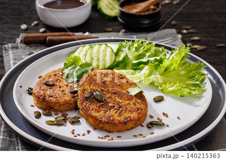 Plant Based Burger Patties With Green Salad Plant Based Burger Patties With Green Salad 140215363