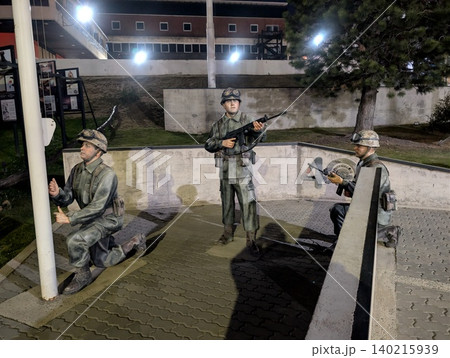 El Calafate, Patagonia, Argentina - March 8, 2026: Argentine soldier statues at a war memorial El Calafate, Patagonia, Argentina - March 8, 2026: Argentine soldier statues at a war memorial 140215939