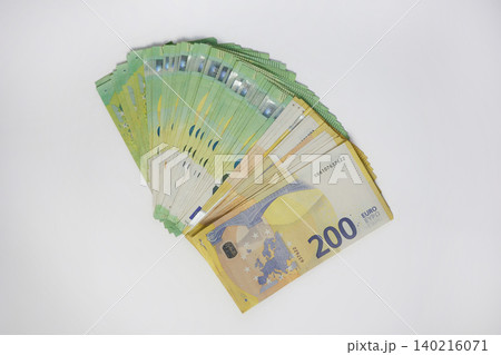 Fan of 100 and 200 Euro Banknotes Isolated on White Background - Wealth, Investment and Financial Success Concept Fan of 100 and 200 Euro Banknotes Isolated on White Background - Wealth, Investment and Financial Success Concept 140216071