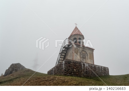 Misty hill holds ancient stone chapels. Georgia. Misty hill holds ancient stone chapels. Georgia. 140216683