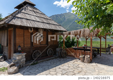 Rustic wooden cabin and outdoor terrace in Prokletije National Park village Rustic wooden cabin and outdoor terrace in Prokletije National Park village 140216975