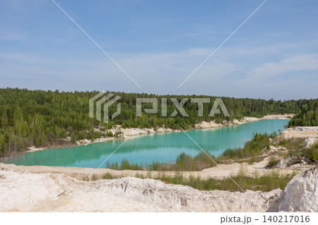 Turquoise lake and white sand quarry landscape in Ural Bali, Russia Turquoise lake and white sand quarry landscape in Ural Bali, Russia 140217016