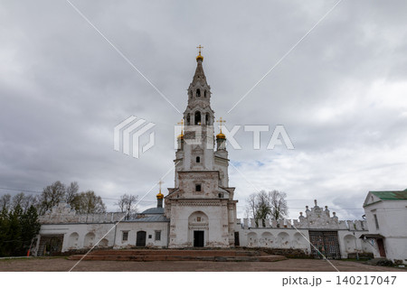 Nevyansk leaning tower and historic Orthodox church complex under cloudy sky Nevyansk leaning tower and historic Orthodox church complex under cloudy sky 140217047