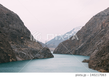 Turquoise river through Naryn Canyon gorge with rugged mountains, Kyrgyzstan Turquoise river through Naryn Canyon gorge with rugged mountains, Kyrgyzstan 140217063