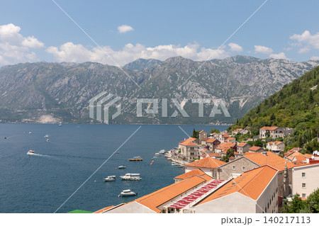 Panoramic view of Perast waterfront and Bay of Kotor with mountains, Montenegro Panoramic view of Perast waterfront and Bay of Kotor with mountains, Montenegro 140217113
