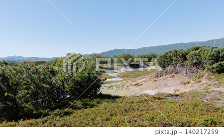 Uzon Volcano caldera landscape with tundra vegetation and distant mountains 140217259