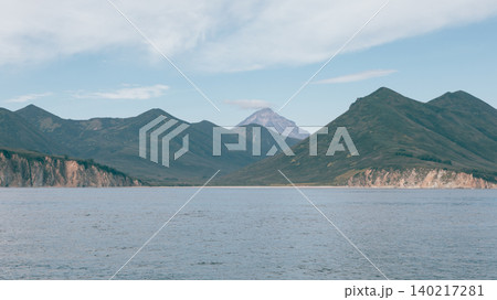 Vilyuchinskaya Bay seascape with distant volcano, Kamchatka Peninsula Vilyuchinskaya Bay seascape with distant volcano, Kamchatka Peninsula 140217281