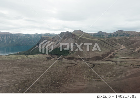 Ksudach volcano caldera landscape with crater lake and rugged ridges, Kamchatka Ksudach volcano caldera landscape with crater lake and rugged ridges, Kamchatka 140217385