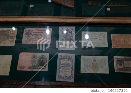 Museum display case with vintage Russian banknotes in Petropavlovsk-Kamchatsky 140217392