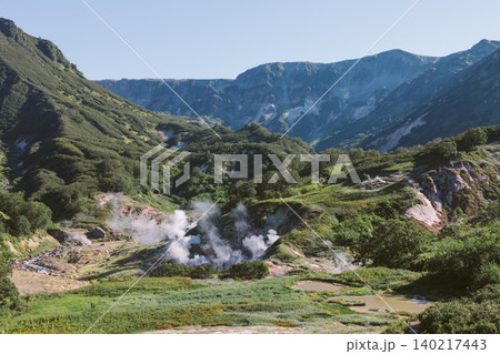 Geothermal steam vents in Valley of Geysers landscape, Kamchatka Peninsula Geothermal steam vents in Valley of Geysers landscape, Kamchatka Peninsula 140217443