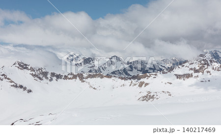 Panoramic view from cable car lifts to Mount Elbrus snowy peaks in Caucasus Panoramic view from cable car lifts to Mount Elbrus snowy peaks in Caucasus 140217469