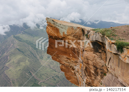 Dramatic Troll Tongue cliff over mountain valley in Dagestan, Russia landscape 140217554
