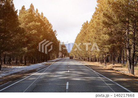Straight forest road to Arshan with distant mountains, Siberia travel landscape 140217668