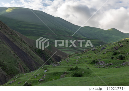 Trekking road to Mount Shalbuzdag through green Caucasus mountains, Dagestan 140217714