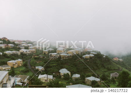 Misty hillside village panorama of Kubachi with stone houses, Dagestan Russia Misty hillside village panorama of Kubachi with stone houses, Dagestan Russia 140217722