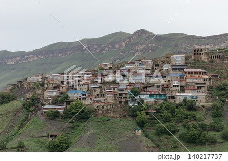 Panoramic view of Chokh mountain village on green slopes in Dagestan 140217737