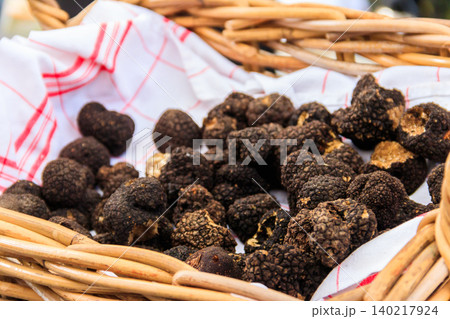 Expensive black truffles gourmet mushrooms in basket Expensive black truffles gourmet mushrooms in basket 140217924