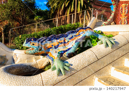Multicolored mosaic dragon salamander of Gaudi in Park Guell, Barcelona, Spain 140217947