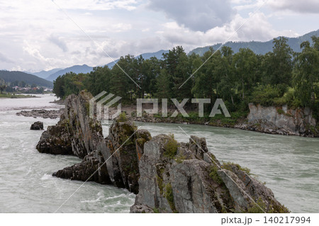 Mountain river and rocky cliffs in Altai Republic landscape on cloudy day 140217994