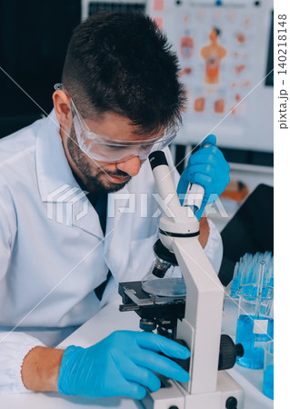 Lab technician experimenting in lab Lab technician experimenting in lab 140218148