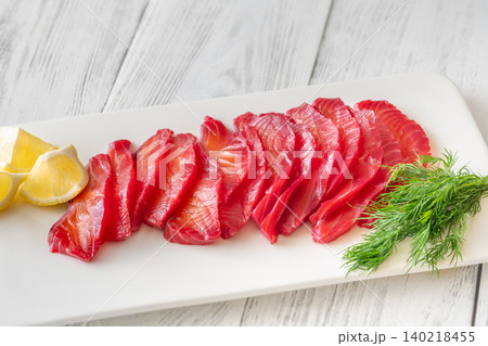 Premium Nordic Salmon Gravlax Appetizer With Herbs And Citrus Garnish Premium Nordic Salmon Gravlax Appetizer With Herbs And Citrus Garnish 140218455