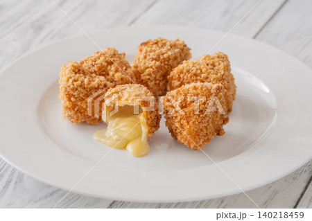 Crispy Fried Camembert Cheese Nuggets Served As Gourmet Appetizer Dish Crispy Fried Camembert Cheese Nuggets Served As Gourmet Appetizer Dish 140218459