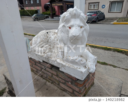 El Calafate, Patagonia, Argentina - March 9, 2026: Decorative lion sculpture near Hotel Kapenke El Calafate, Patagonia, Argentina - March 9, 2026: Decorative lion sculpture near Hotel Kapenke 140218982