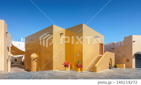 Doha, Qatar - Jan 14 2024, Panoramic view of Golden Mosque decorated with golden tiles, in Katara cultural village at daytime with blue sky, Doha, Qatar Doha, Qatar - Jan 14 2024, Panoramic view of Golden Mosque decorated with golden tiles, in Katara cultural village at daytime with blue sky, Doha, Qatar 140219272