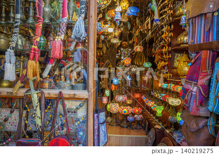 Doha, Qatar - Jan 14 2024, View of the interior of an Arab souvenir shop with lots of colorful glass lamps, lanterns and other things, at Souq Waqif Bazaar, Doha, Qatar Doha, Qatar - Jan 14 2024, View of the interior of an Arab souvenir shop with lots of colorful glass lamps, lanterns and other things, at Souq Waqif Bazaar, Doha, Qatar 140219275