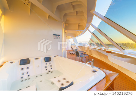 Doha, Qatar - Jan 14 2024, Panoramic view of the terrace from the Jacuzzi of the cabin of the MSC Virtuosa cruise ship, at evening, Doha, Qatar Doha, Qatar - Jan 14 2024, Panoramic view of the terrace from the Jacuzzi of the cabin of the MSC Virtuosa cruise ship, at evening, Doha, Qatar 140219276