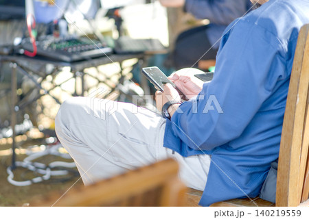 man use smartphone in the cafe 140219559