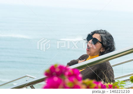 A woman wearing sunglasses A woman wearing sunglasses 140221210