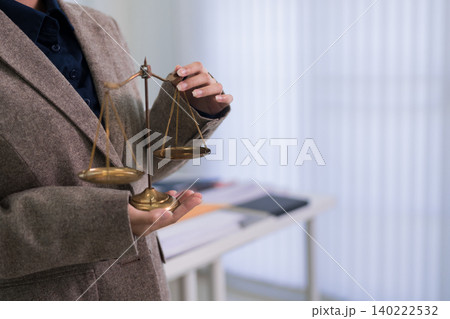 professional lawyer holding justice scale symbol legal advice attorney advocate concept representing fairness equality law justice system courtroom litigation 140222532