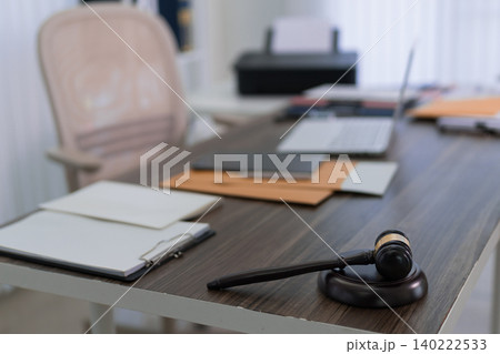 lawyer office desk with judge gavel wooden mallet legal documents notebook pen printer equipment workspace justice profession law attorney workplace legal lawyer office desk with judge gavel wooden mallet legal documents notebook pen printer equipment workspace justice profession law attorney workplace legal 140222533
