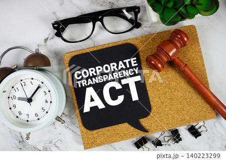 Corporate Transparency Act text on speech bubble with alarm clock and wooden gavel on marble background Corporate Transparency Act text on speech bubble with alarm clock and wooden gavel on marble background 140223299