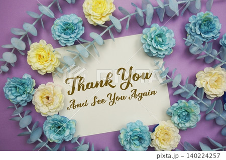 Thank You text written on paper card with flowers decoration Thank You text written on paper card with flowers decoration 140224257