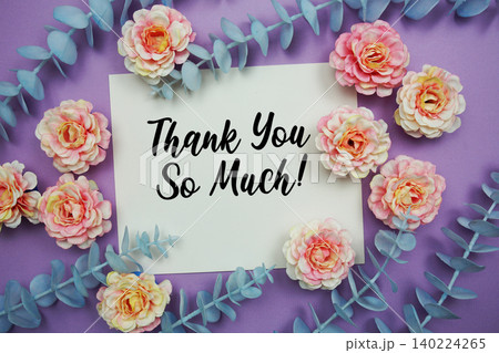 Thank You text written on paper card with flowers decoration Thank You text written on paper card with flowers decoration 140224265