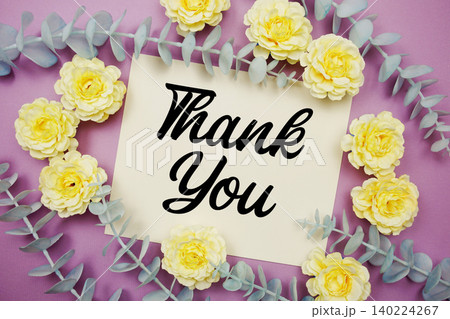 Thank You text written on paper card with flowers decoration Thank You text written on paper card with flowers decoration 140224267