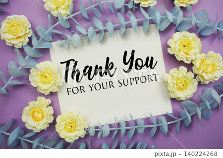 Thank You text written on paper card with flowers decoration 140224268
