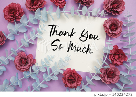 Thank You text written on paper card with flowers decoration Thank You text written on paper card with flowers decoration 140224272