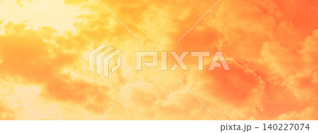 Colorful cloudy sky at sunset. The sun shines through the clouds. Color gradient. The texture of the sky. Abstract nature background. Horizontal banner. Real photo. Not by AI 140227074