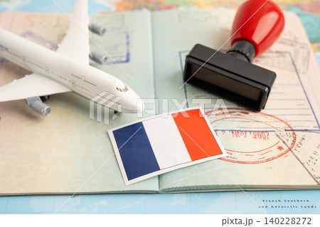 France flag and passport with airplane for travel. 140228272