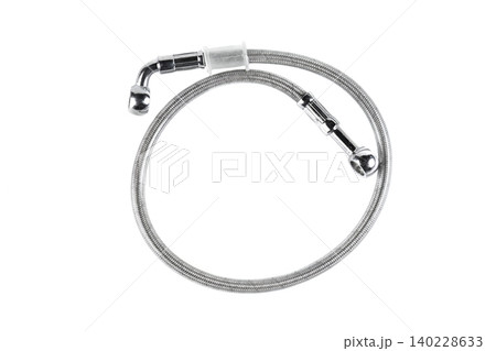Motorcycle braided stainless steel brake line hose with banjo fittings isolated. Motorcycle braided stainless steel brake line hose with banjo fittings isolated. 140228633