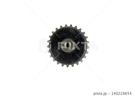 Motorcycle engine steel timing chain sprocket wheel with internal thread isolated top view. Motorcycle engine steel timing chain sprocket wheel with internal thread isolated top view. 140228654