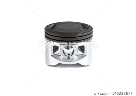 Motorcycle engine aluminum piston assembly with installed rings isolated on white. 140228677