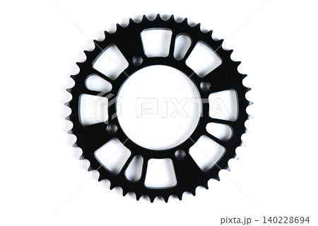 Motorcycle rear drive chain sprocket wheel with weight reduction cutouts top view. Motorcycle rear drive chain sprocket wheel with weight reduction cutouts top view. 140228694